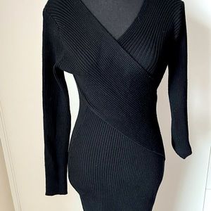Classic black stetchy dress, long sleeve, size small, cross over in the front.